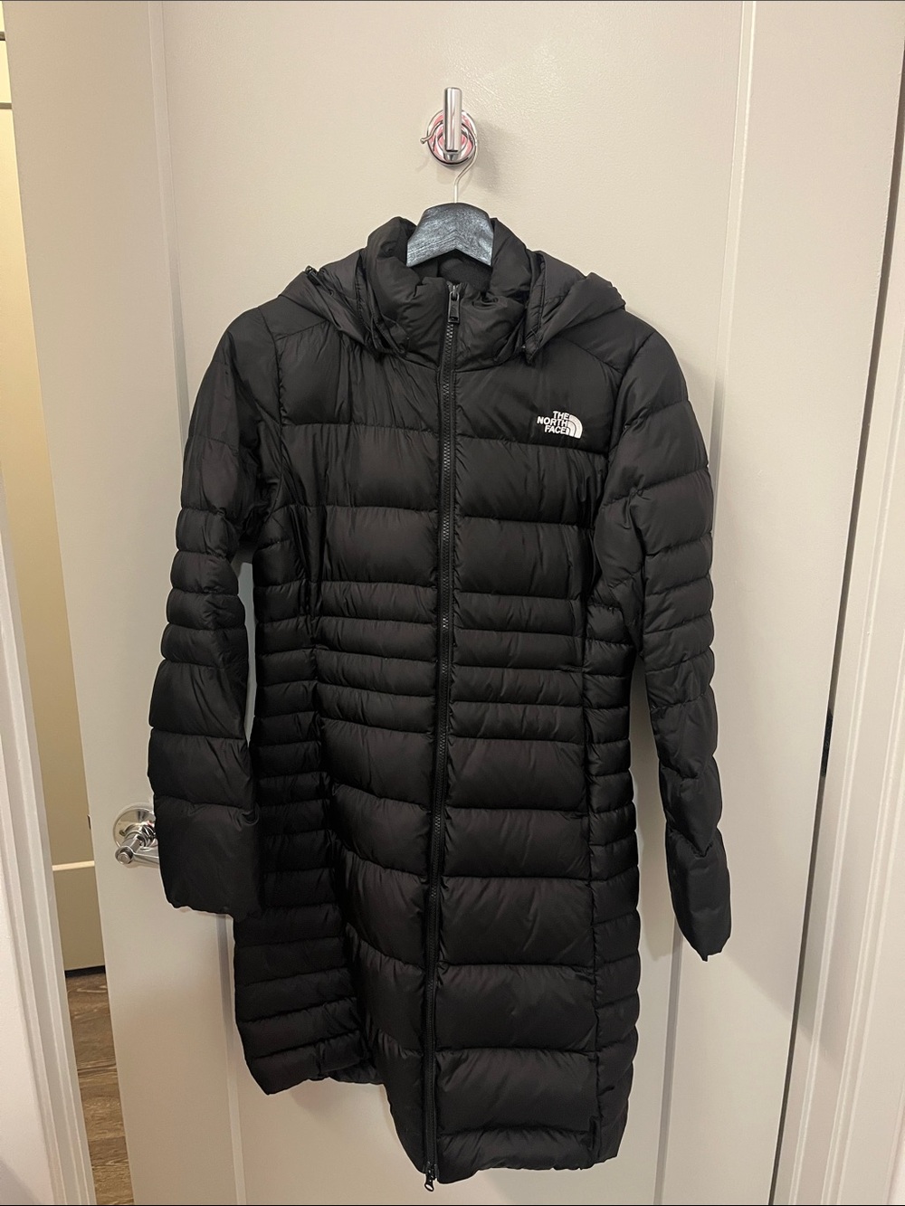The North Face women’s Black Long Hooded Coat